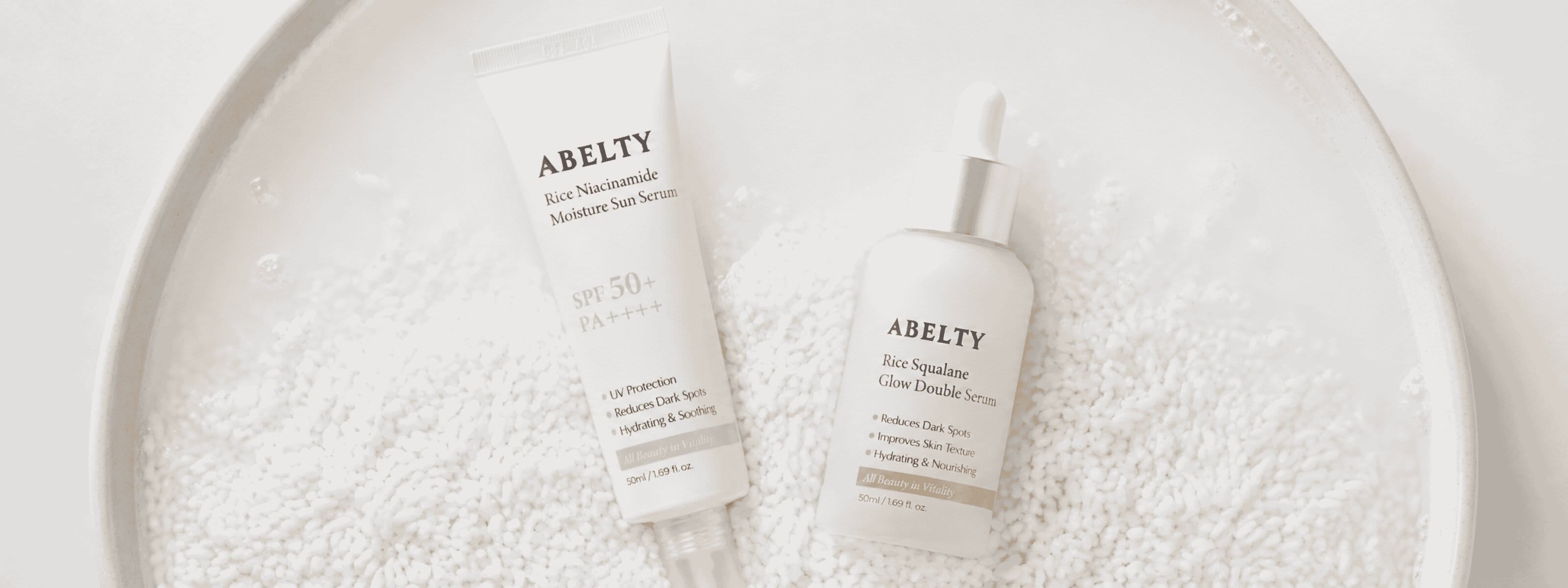 Abelty skincare collection with Double Serum EAN 8809990866809 and Sun Serum SPF50+ EAN 8809990866816, combining deep hydration, brightening care and broad-spectrum sun protection for healthy glowing skin.